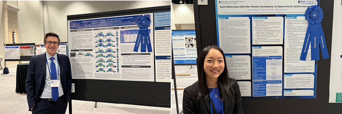 Nathan and Avivah in front of their poster presentations 