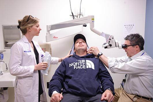 Ariel and Dr. Kaylie with a patient 