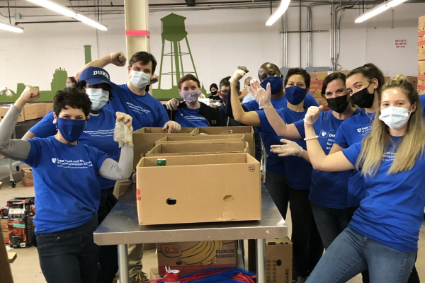 Members of Duke HNS&CS sort donations to the Durham Food Bank 