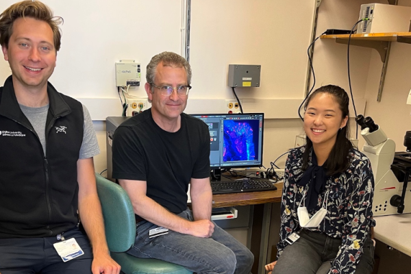Dr. Goldstein (center) works with two members of the Goldstein Lab: Jack Finlay, MD, PhD student [left], and Tiffany Ko, a Neurobiology graduate student [right]