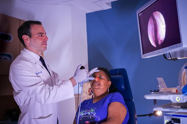 Dr. Abi Hachem with a patient