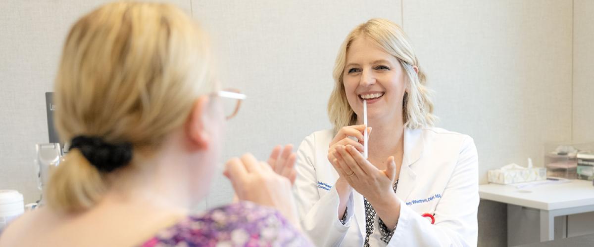 Voice therapy session with patient