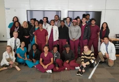Students from the Duke Health Career Academy with medical students in the General Surgery Interest Group