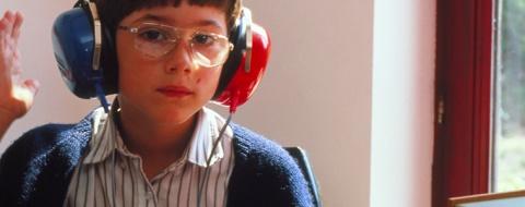 A child undergoes a hearing test