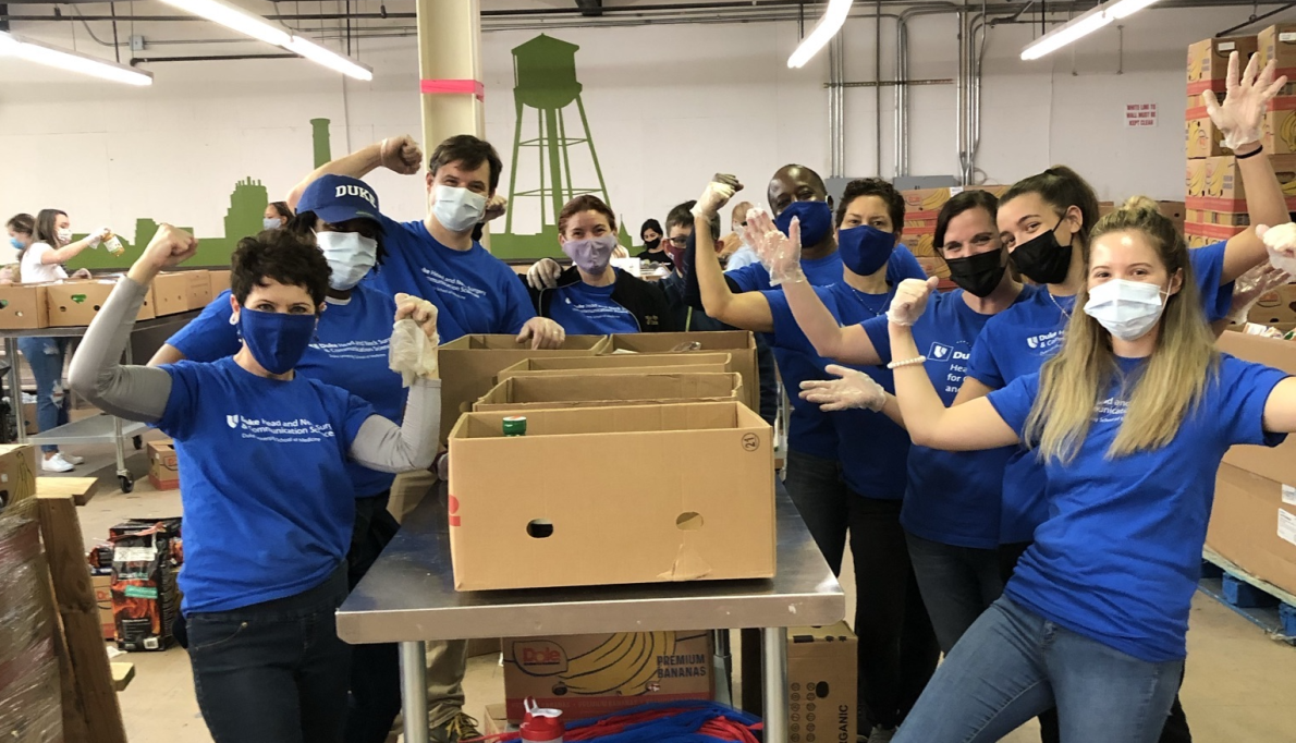 Members of Duke HNS&CS sort donations to the Durham Food Bank 