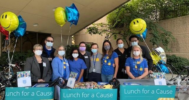 HNS&CS faculty, staff, and family volunteered to help at the Smile Stand Event 