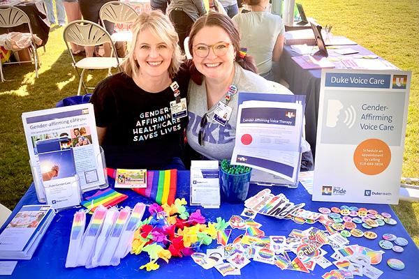 Annika Wilson, M.S., CCC-SLP, and Audrey Walstom, DMA, MA, CCC-SLP, at vendor table