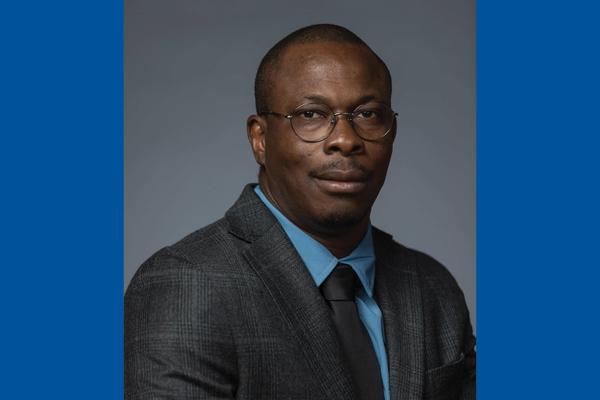 Headshot of Dr. Frank-Ito on blue background