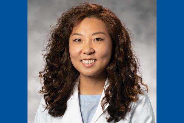 Profile of Sarah Kim on blue background