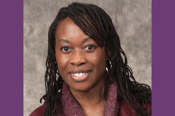 Headshot of Dr. Fannin on purple background