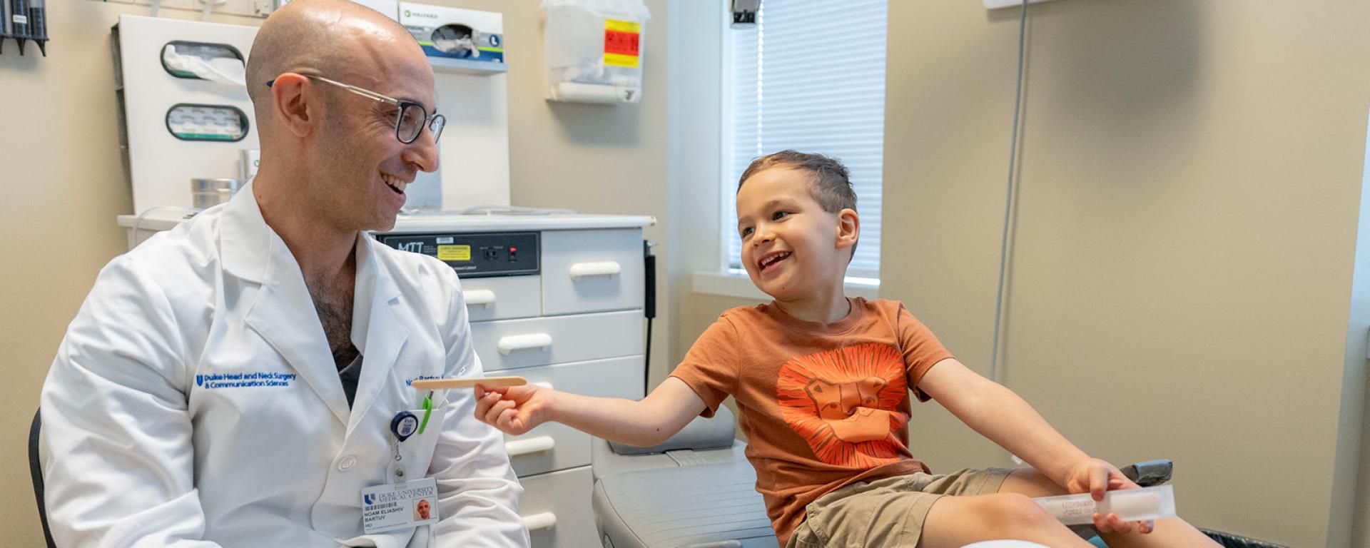 Dr. Batruv with child patient