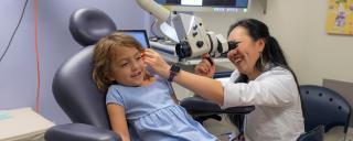 Dr. Janet Lee with pediatric patient 