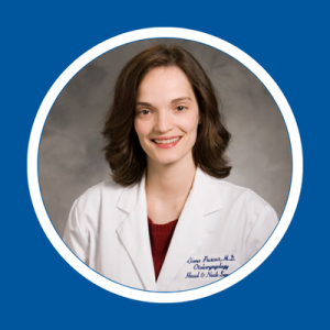 Headshot of Dr. Puscas on blue background 