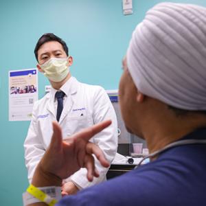 Dr. Jang and patient 600x400