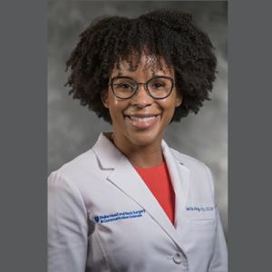 Portrait of Jamila Minga on Gray Background