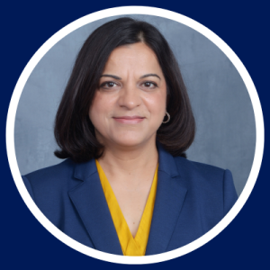 Headshot of Dr. Nidhi Mahendra on Duke blue background 