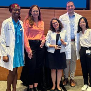 Photo of group including Somtochi Okafor, Dr. Collins, Dr. Cecelia E. Schmalback, Connor Pratson, and Debbie Pan