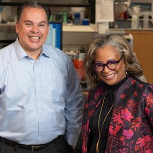 Blobe and Watts in lab standing next to each other 
